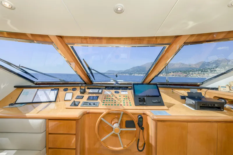  Yacht Photos Pics Cockpit of 1999 Falcon Yachts 86 with panoramic sea view and navigation controls.