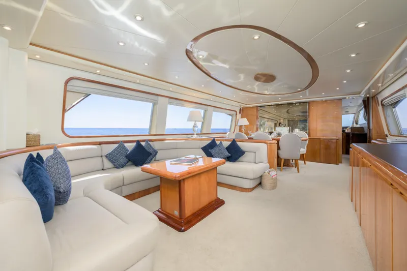  Yacht Photos Pics Luxurious interior of 1999 Falcon Yachts 86, featuring elegant seating and ocean views.