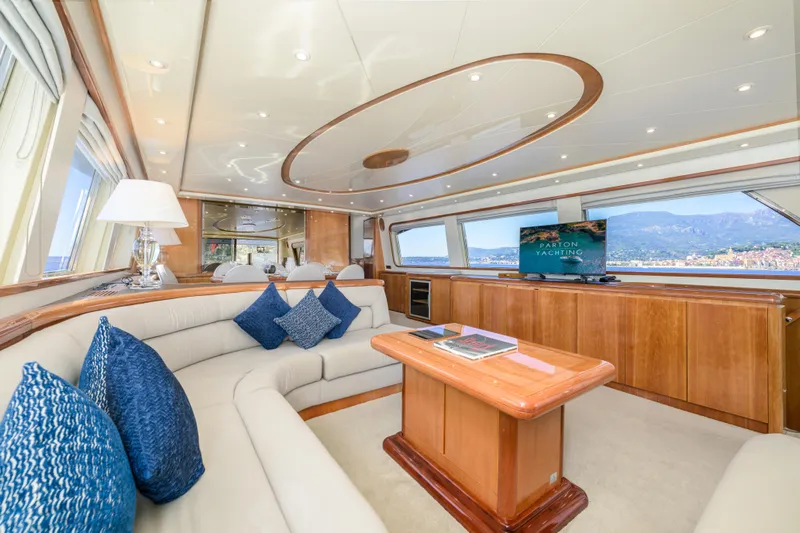  Yacht Photos Pics Luxurious interior of 1999 Falcon Yachts 86 with elegant seating and scenic views.