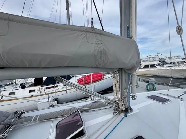 Maxwell Yacht Photos Pics Catalina 42 MkII sailboat, 2001 model, docked with covered mainsail and visible rigging.