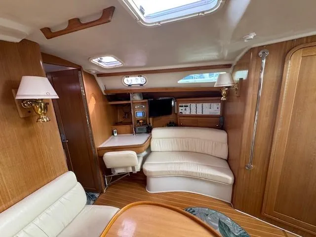 Maxwell Yacht Photos Pics Interior of 2001 Catalina 42 MkII sailboat with wood finish and seating area.