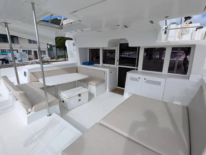 Southern Charm Yacht Photos Pics Spacious deck of 2015 Lagoon 450 F catamaran with comfortable seating and modern design.