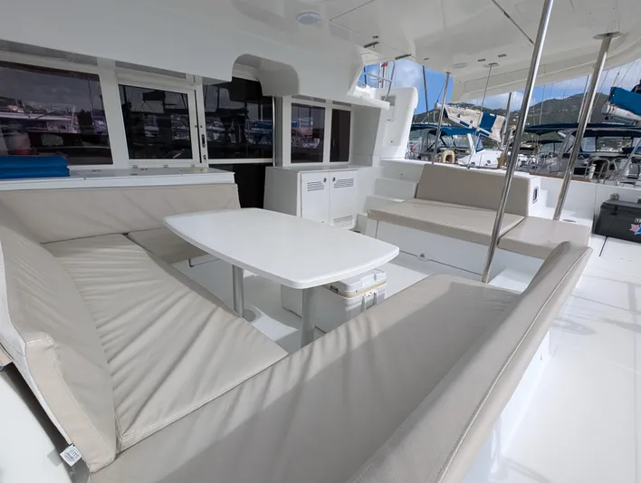 Southern Charm Yacht Photos Pics Spacious seating area on 2015 Lagoon 450 F catamaran with modern design.