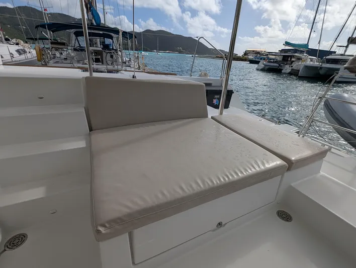 Southern Charm Yacht Photos Pics Lagoon 450 F 2015 yacht seating area with marina view and surrounding boats.