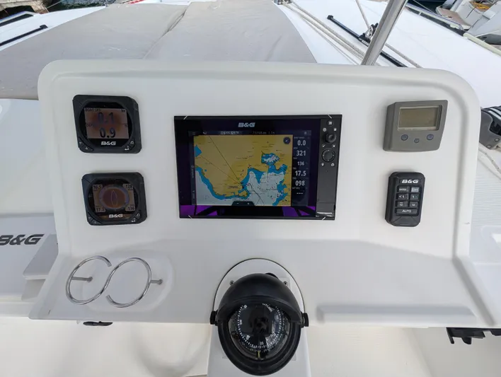 Southern Charm Yacht Photos Pics Navigation console of 2015 Lagoon 450 F catamaran with B&G instruments and compass.