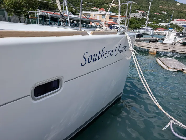Southern Charm Yacht Photos Pics Lagoon 450 F catamaran named "Southern Charm" docked at a marina, 2015 model.