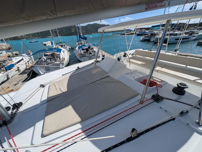 Southern Charm Yacht Photos Pics 2015 Lagoon 450 F catamaran docked at marina with scenic ocean view.