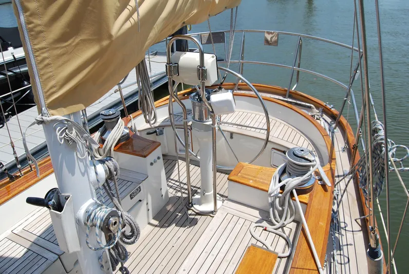 Sappho Yacht Photos Pics 1983 Cherubini 44 Ketch sailboat deck with wooden accents and rigging.