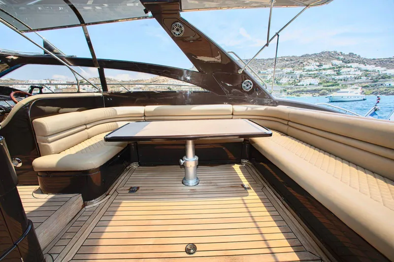  Yacht Photos Pics Luxurious 1996 Princess V52 yacht interior with elegant seating and scenic ocean view.