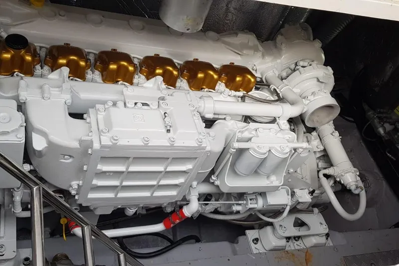  Yacht Photos Pics Engine of a 1996 Princess V52 yacht, featuring white and gold components.