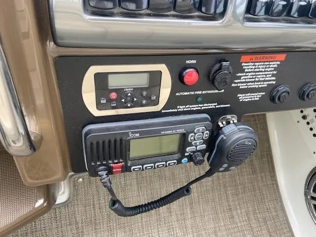  Yacht Photos Pics Control panel of a 2017 Formula 350 Sun Sport boat with radio and safety features.