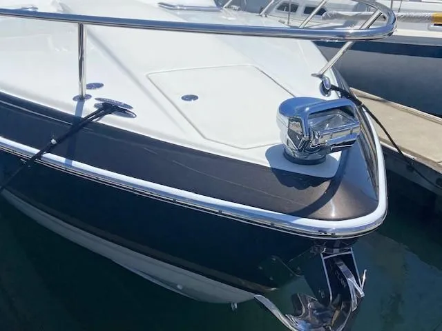  Yacht Photos Pics 2017 Formula 350 Sun Sport boat docked, showcasing sleek bow design.