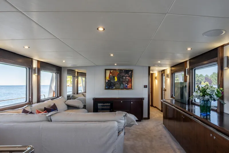 Sultana Yacht Photos Pics Luxurious interior of 1969 Feadship 25.8m yacht with elegant decor and ocean views.