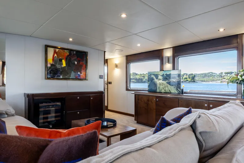 Sultana Yacht Photos Pics Luxurious interior of 1969 Feadship 25.8m yacht with modern decor and scenic views.