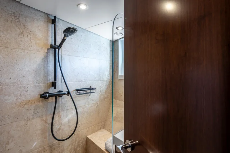 Sultana Yacht Photos Pics Luxurious yacht bathroom with modern shower, Feadship 25.8m, 1969 model.