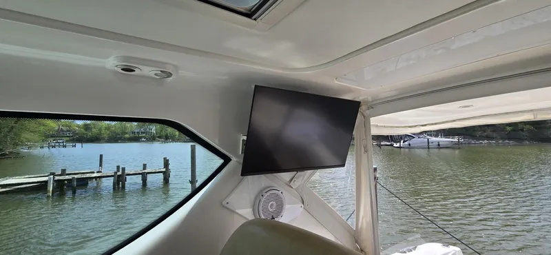 Lion Around Yacht Photos Pics Interior view of 2006 Tiara Yachts 4300 Sovran with TV and water view.