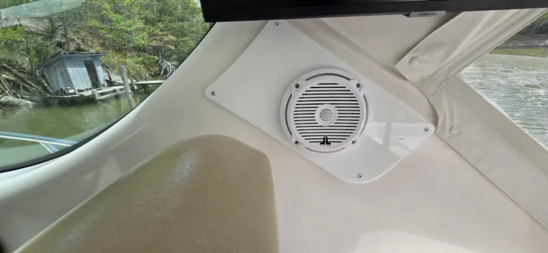 Lion Around Yacht Photos Pics Interior of 2006 Tiara Yachts 4300 Sovran with speaker and window view.