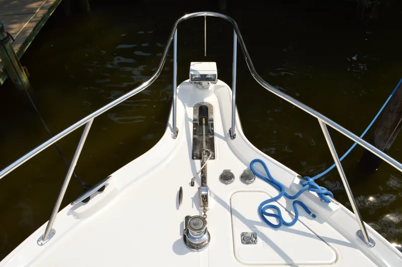Lion Around Yacht Photos Pics Bow of 2006 Tiara Yachts 4300 Sovran with anchor and blue rope.