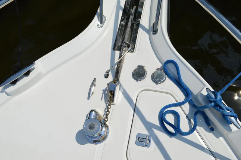 Lion Around Yacht Photos Pics 2006 Tiara Yachts 4300 Sovran deck with anchor chain and blue rope.