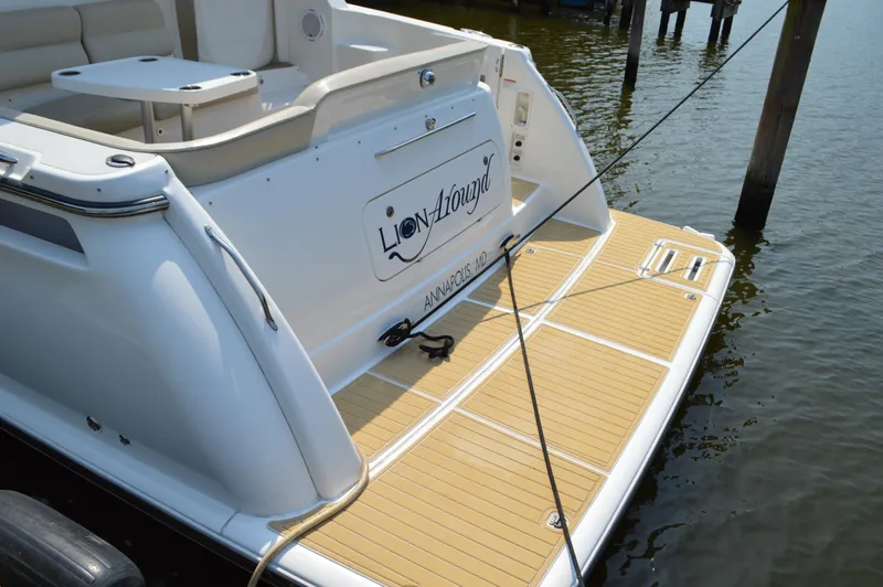 Lion Around Yacht Photos Pics 2006 Tiara Yachts 4300 Sovran, rear view with teak swim platform, docked.