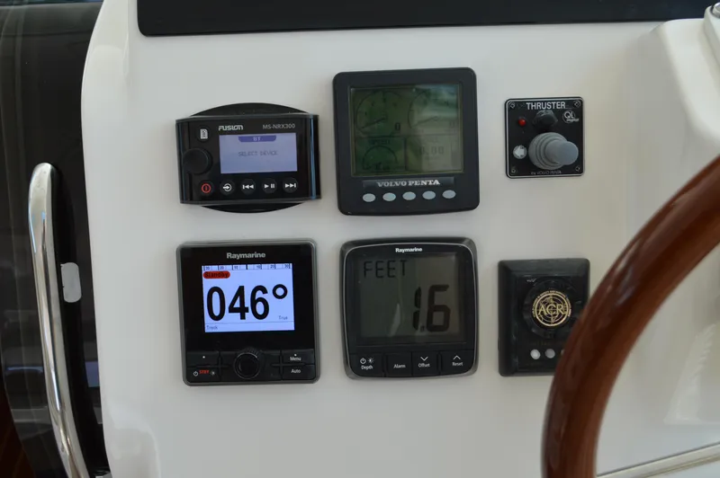 Lion Around Yacht Photos Pics Dashboard of 2006 Tiara Yachts 4300 Sovran with navigation instruments and controls.
