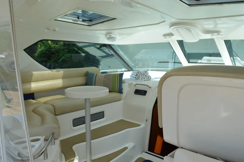 Lion Around Yacht Photos Pics Luxurious interior of 2006 Tiara Yachts 4300 Sovran with plush seating and modern design.