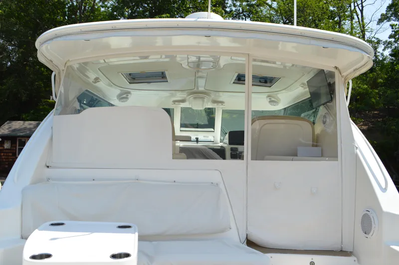 Lion Around Yacht Photos Pics 2006 Tiara Yachts 4300 Sovran, rear view of cockpit and seating area.