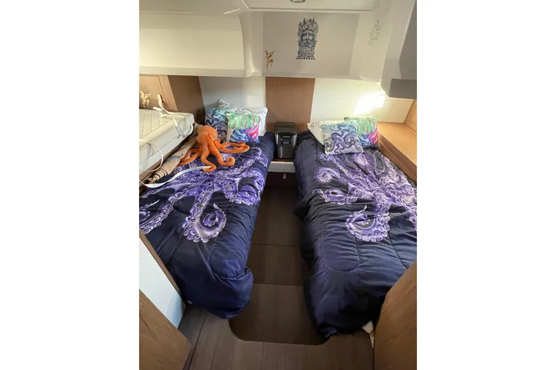  Yacht Photos Pics Cabin interior of 2018 Benetau Gran Turismo 40 with octopus-themed bedding.