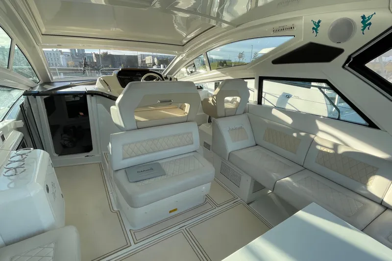  Yacht Photos Pics Luxurious interior of 2018 Benetau Gran Turismo 40 yacht with elegant seating and modern design.