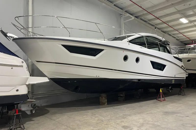  Yacht Photos Pics 2018 Benetau Gran Turismo 40 yacht in indoor storage, side view.