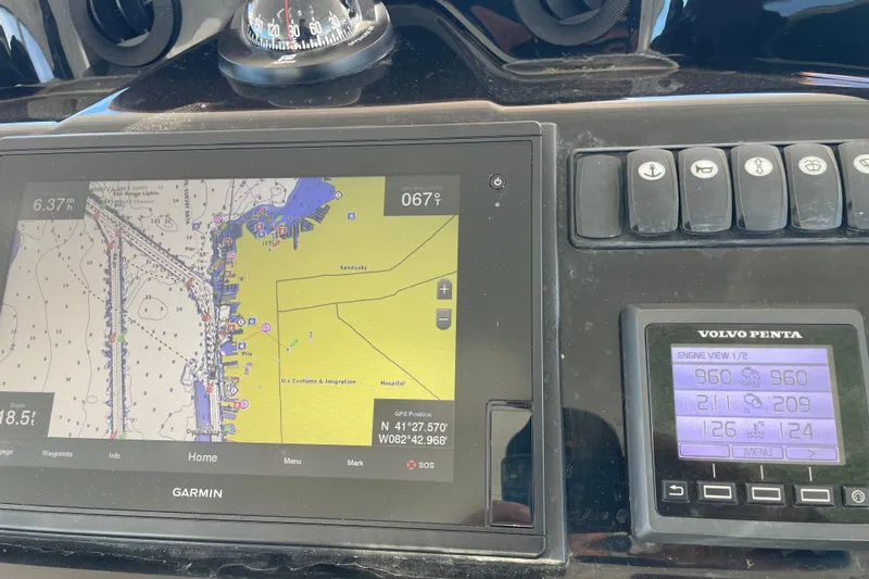  Yacht Photos Pics Dashboard of a 2018 Benetau Gran Turismo 40 with Garmin navigation and Volvo Penta engine display.