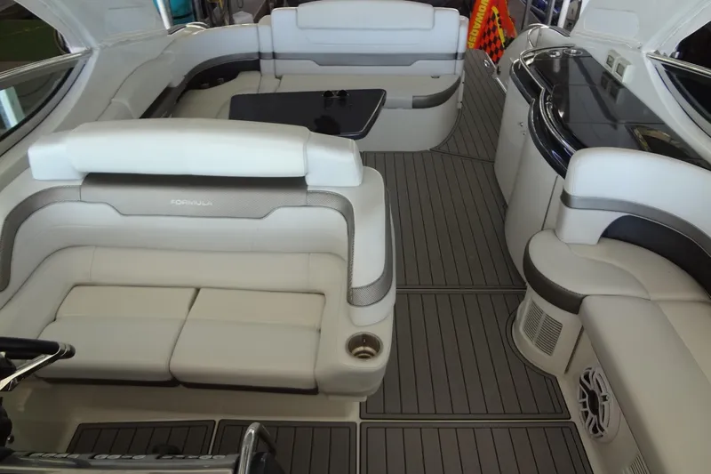 Double Double Yacht Photos Pics Luxurious interior of a 2019 Formula 400 Super Sport boat with elegant seating.