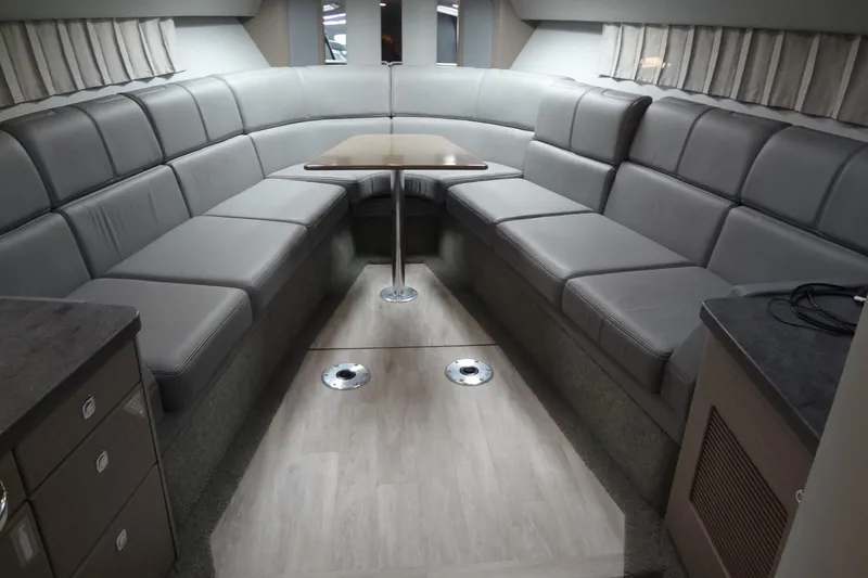 Double Double Yacht Photos Pics Luxurious interior of 2019 Formula 400 Super Sport yacht with plush seating and table.