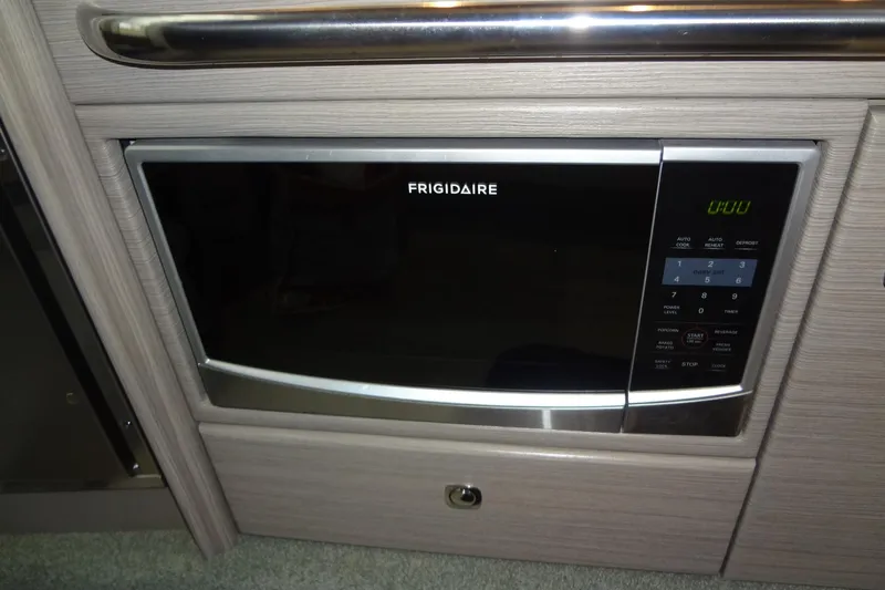Double Double Yacht Photos Pics Frigidaire microwave in 2019 Formula 400 Super Sport boat interior.