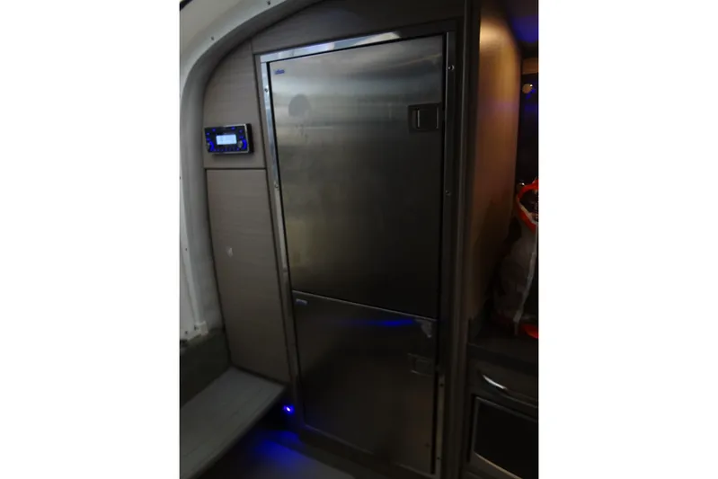 Double Double Yacht Photos Pics 2019 Formula 400 Super Sport interior with stainless steel refrigerator and control panel.