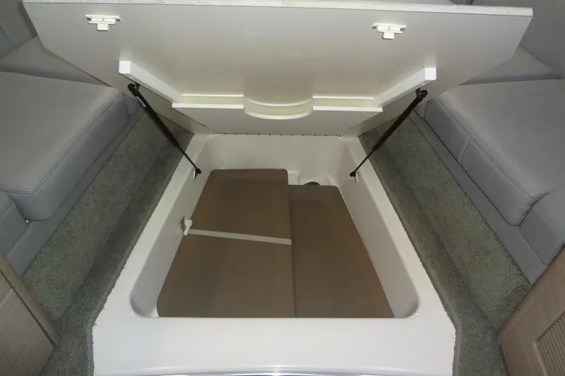 Double Double Yacht Photos Pics 2019 Formula 400 Super Sport interior storage compartment with open hatch and seating.