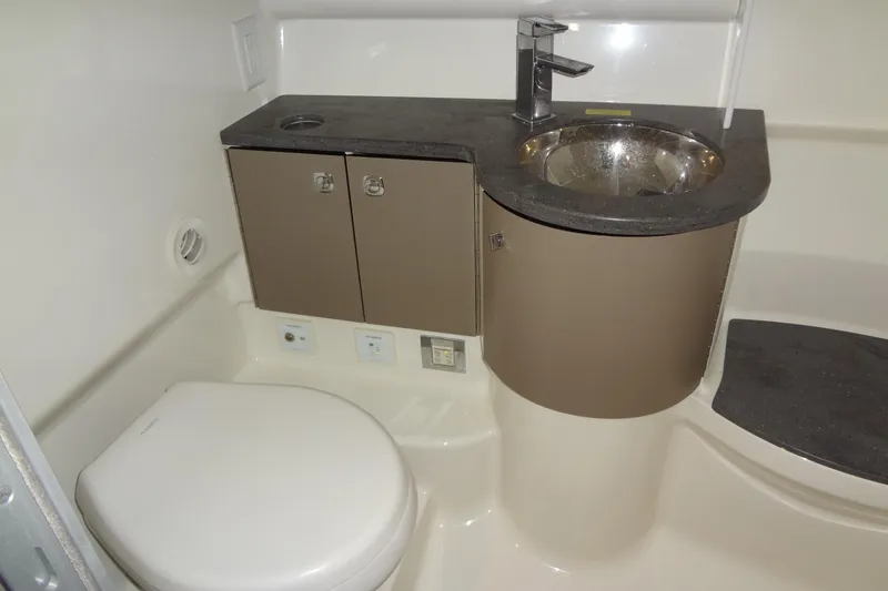 Double Double Yacht Photos Pics 2019 Formula 400 Super Sport bathroom with modern sink and toilet design.