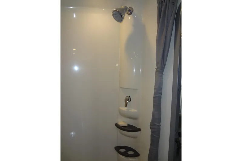 Double Double Yacht Photos Pics Shower area in 2019 Formula 400 Super Sport boat with curtain and shelves.