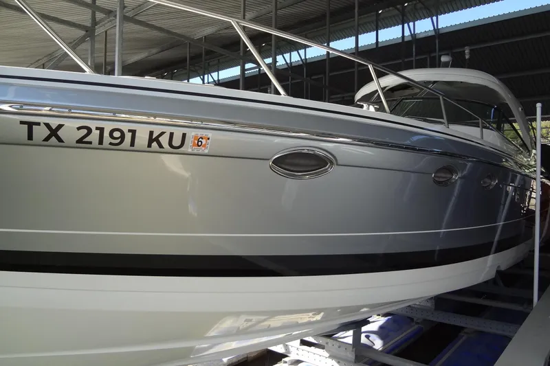 Double Double Yacht Photos Pics 2019 Formula 400 Super Sport boat docked in covered marina.