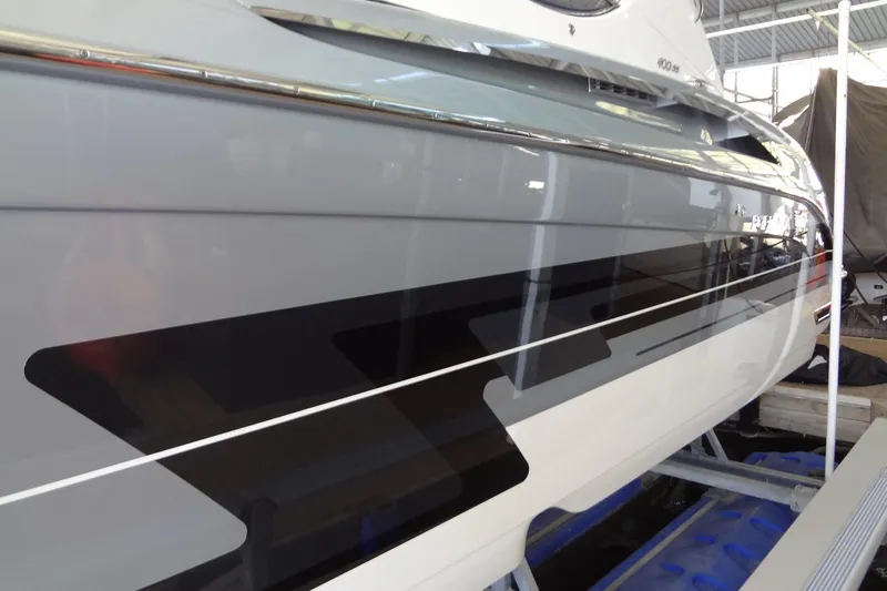 Double Double Yacht Photos Pics 2019 Formula 400 Super Sport boat with sleek black and white design in a showroom.