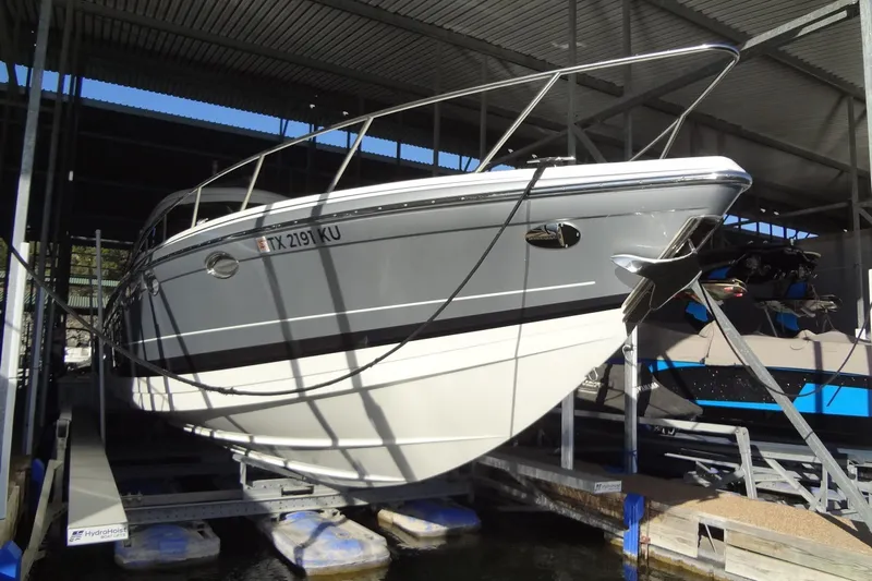 Double Double Yacht Photos Pics 2019 Formula 400 Super Sport boat docked in a covered marina.