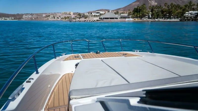 Debbie Yacht Photos Pics 2021 Beneteau Gran Turismo 32 yacht on serene blue waters, coastal view.