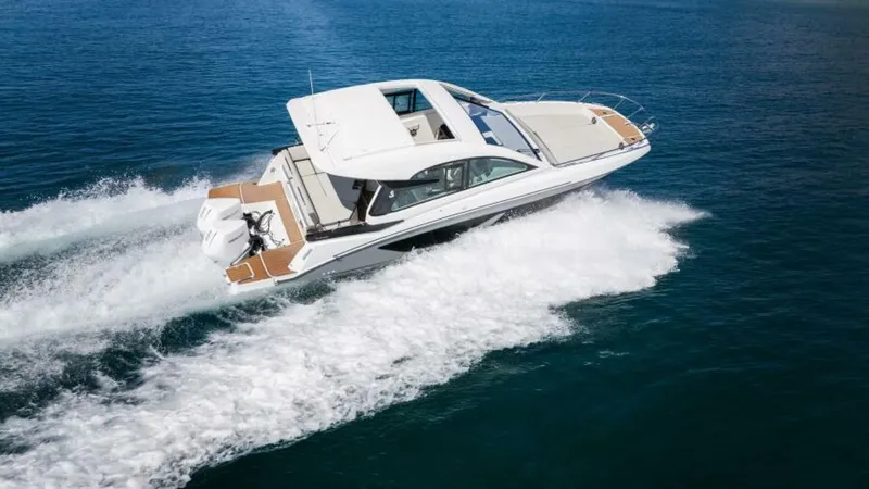Debbie Yacht Photos Pics 2021 Beneteau Gran Turismo 32 cruising on open water, showcasing sleek design and performance.