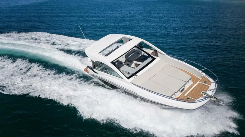Debbie Yacht Photos Pics 2021 Beneteau Gran Turismo 32 cruising on open water, showcasing sleek design and performance.