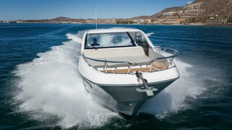 Debbie Yacht Photos Pics 2021 Beneteau Gran Turismo 32 cruising on open water, showcasing sleek design and performance.