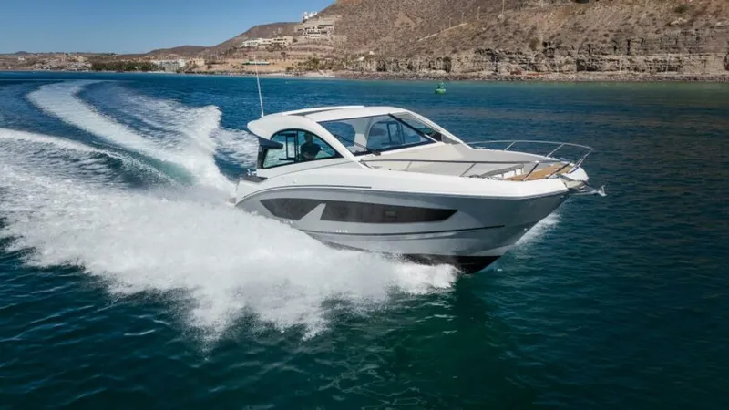 Debbie Yacht Photos Pics 2021 Beneteau Gran Turismo 32 cruising on open water, showcasing sleek design and performance.