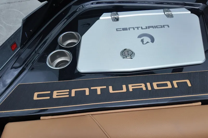  Yacht Photos Pics 2025 Centurion Fe23 boat interior with branded storage and cup holders.