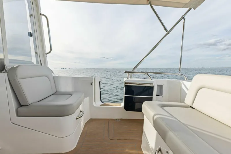  Yacht Photos Pics 2025 MJM 35 boat interior with comfortable seating and ocean view.