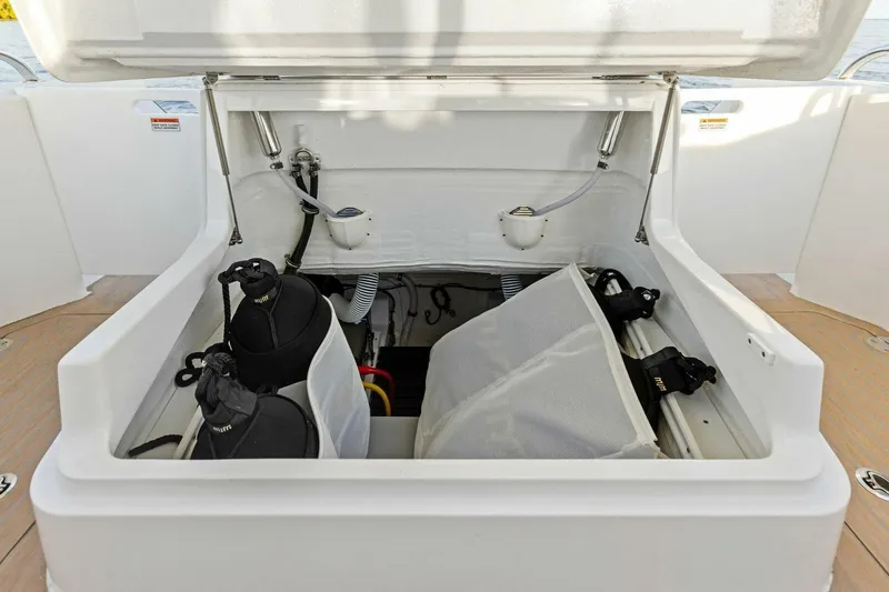  Yacht Photos Pics Storage compartment on 2025 MJM 35 boat with scuba gear and equipment.