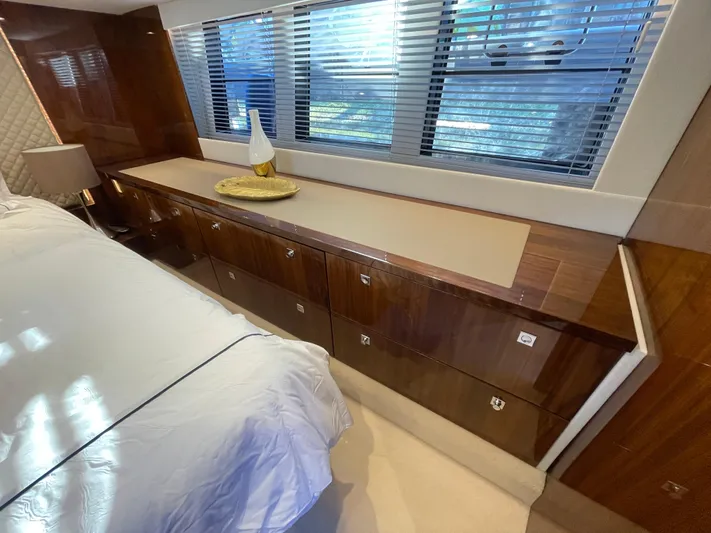  Yacht Photos Pics Luxurious interior of 2017 Fairline Squadron 48 yacht with elegant wood cabinetry and modern decor.